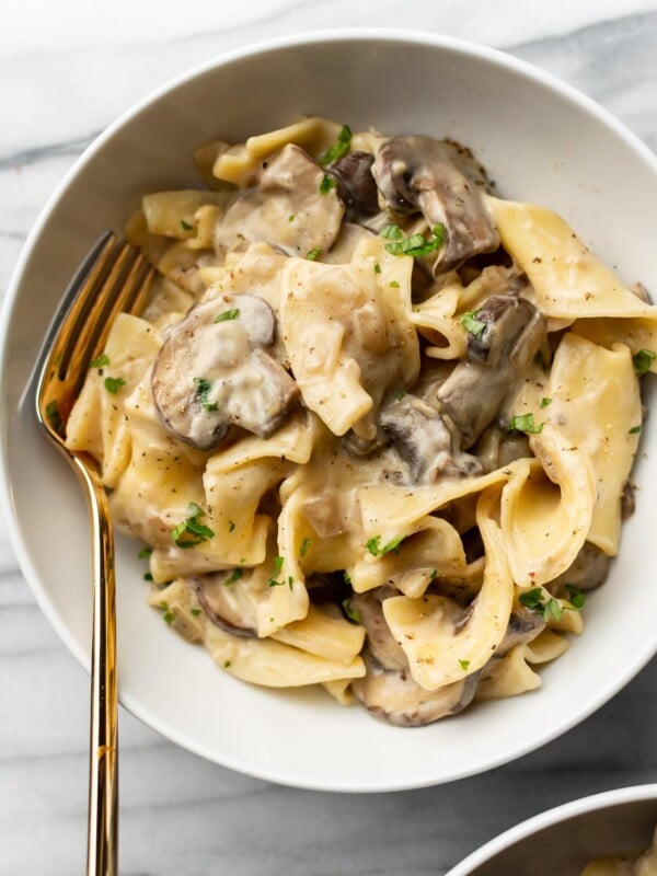 close-up of mushroom stroganoff in a white bowl