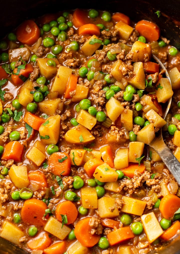 close-up of hamburger stew being ladled