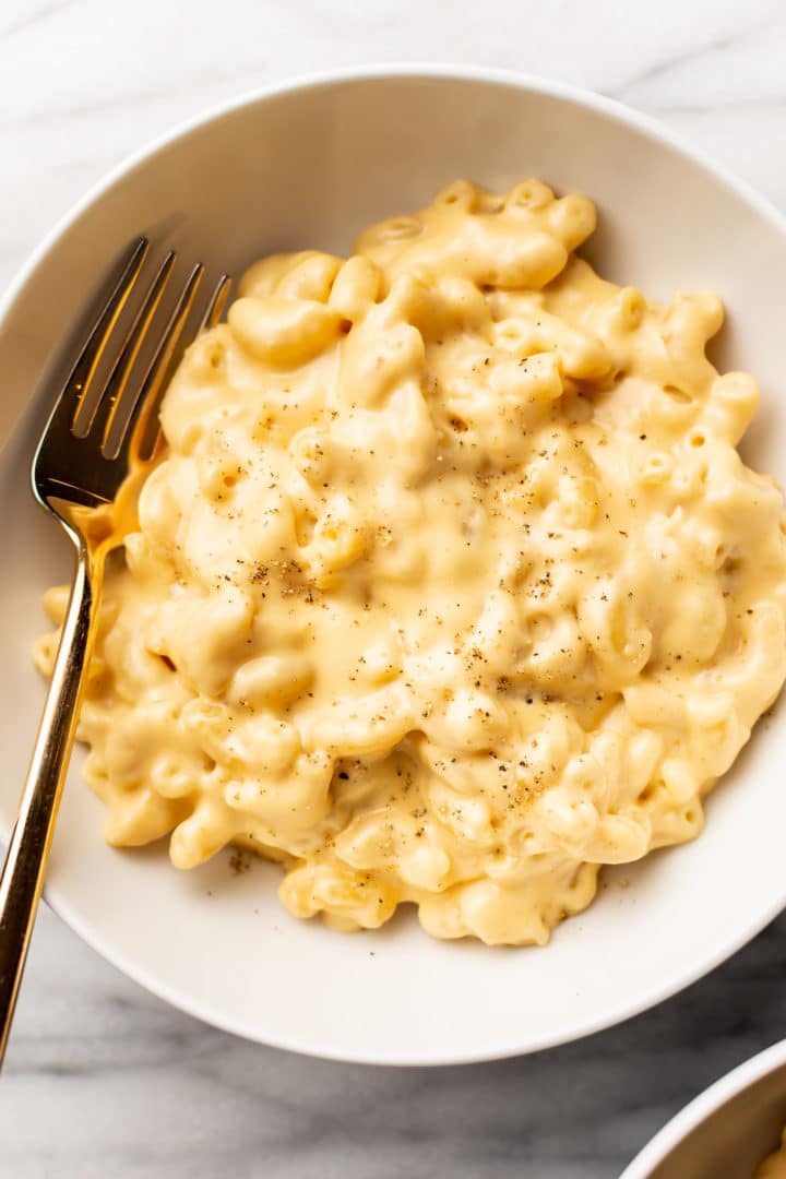close-up of creamy stovetop mac and cheese in a white bowl