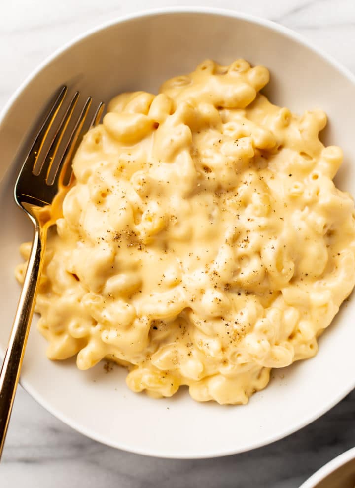 close-up of creamy stovetop mac and cheese in a white bowl