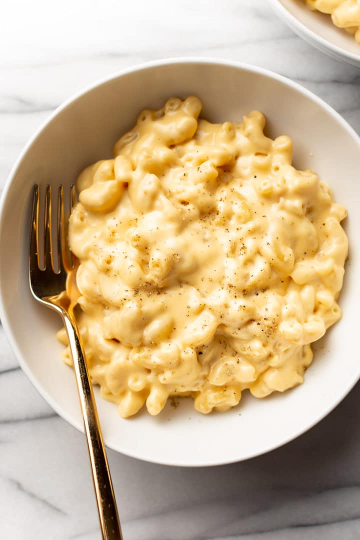 homemade stovetop mac and cheese in two white bowls