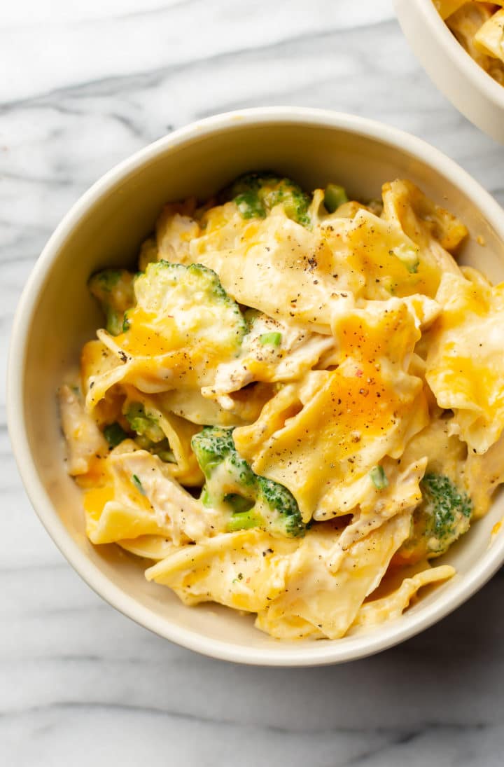 easy chicken noodle casserole in two beige bowls