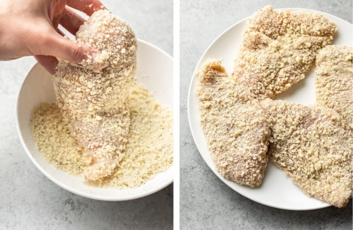 a hand dipping chicken cutlet into panko breading for parmesan crusted chicken
