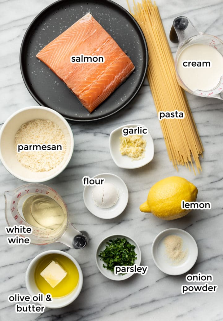 process shot of ingredient quantities in dishes for making creamy salmon pasta with a garlic sauce