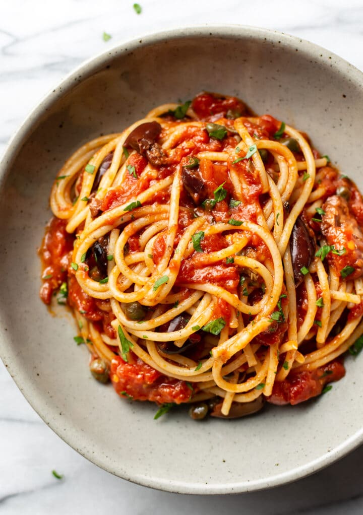 a bowl of spaghetti alla puttanesca