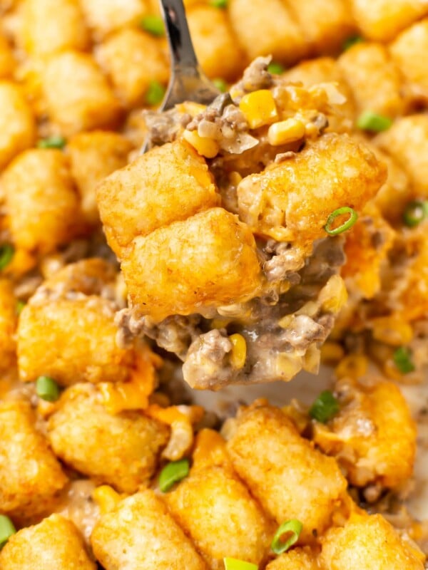 a spatula serving tater tot casserole