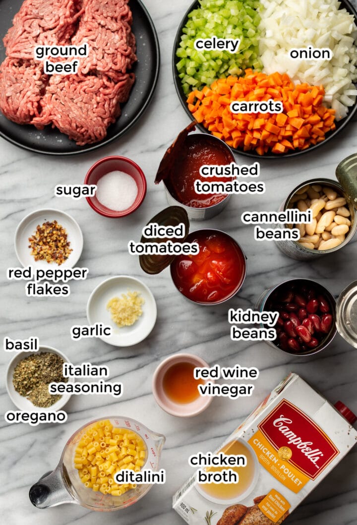 ingredients for olive garden pasta e fagioli on a marble surface