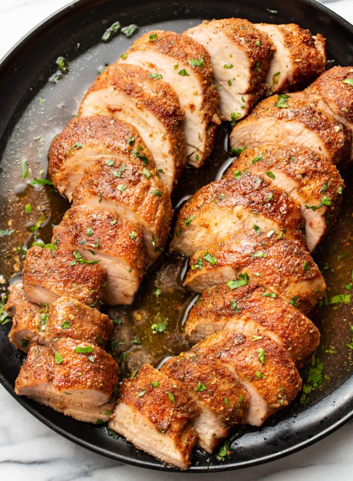 a plate with pork tenderloin slices