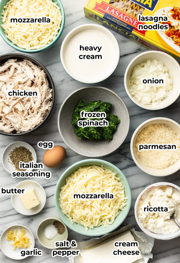 ingredients for creamy chicken lasagna on a counter in bowls