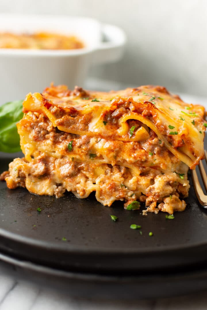 a plate with a slice of lasagna