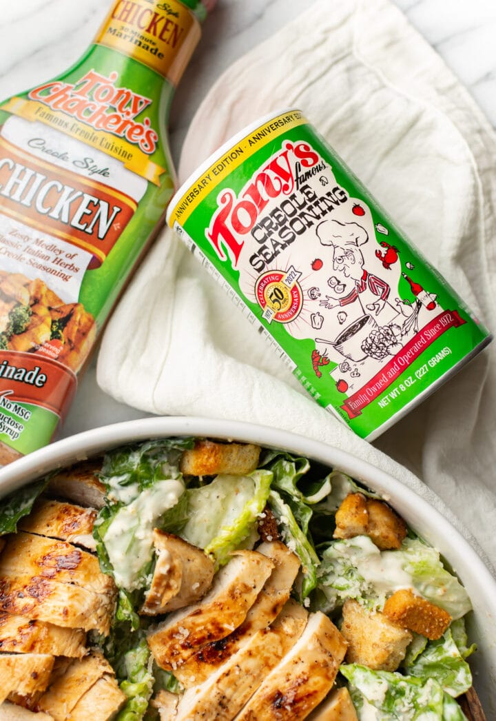 closeup of cajun chicken caesar salad with tony chachere products