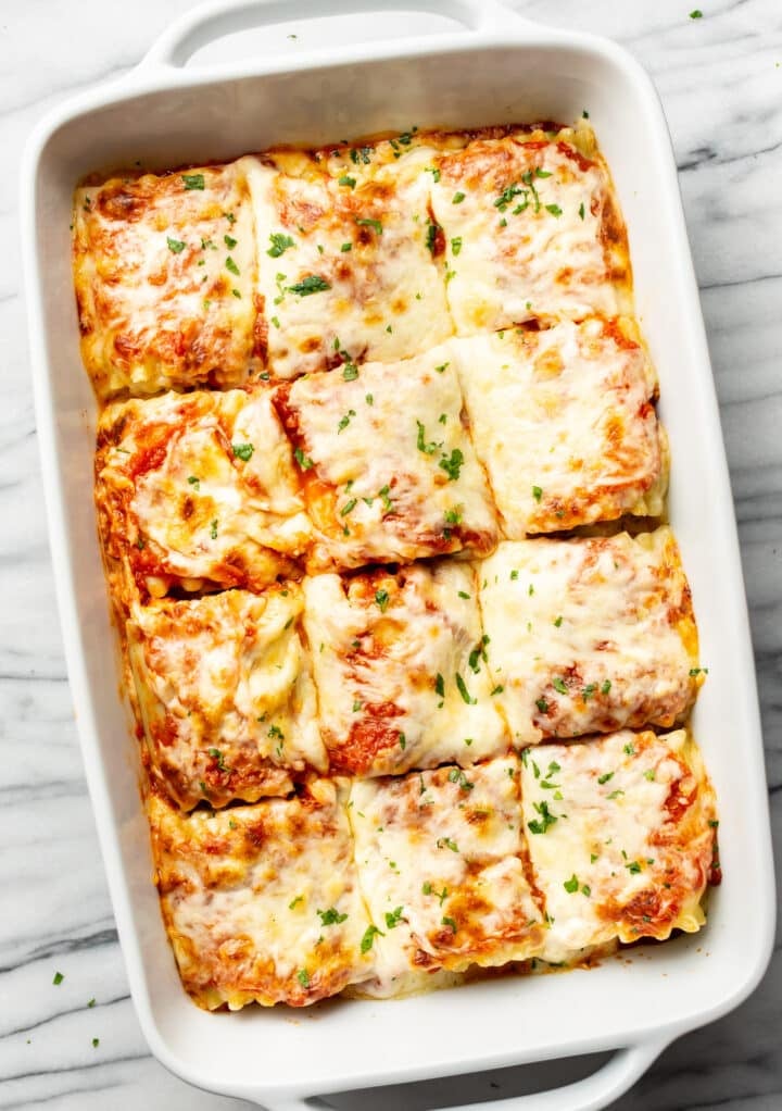 a casserole dish with lasagna roll ups