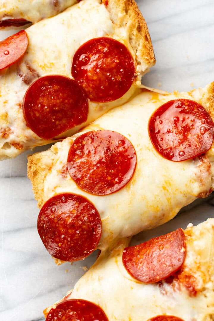 closeup of slices of pepperoni french bread pizza