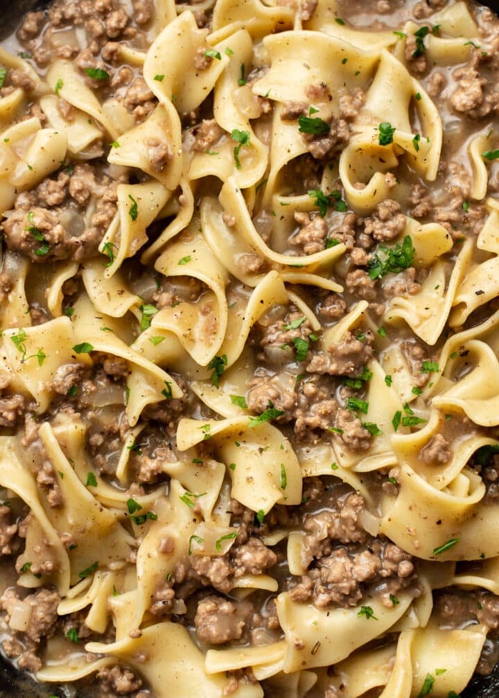 closeup of beef and noodles in a skillet