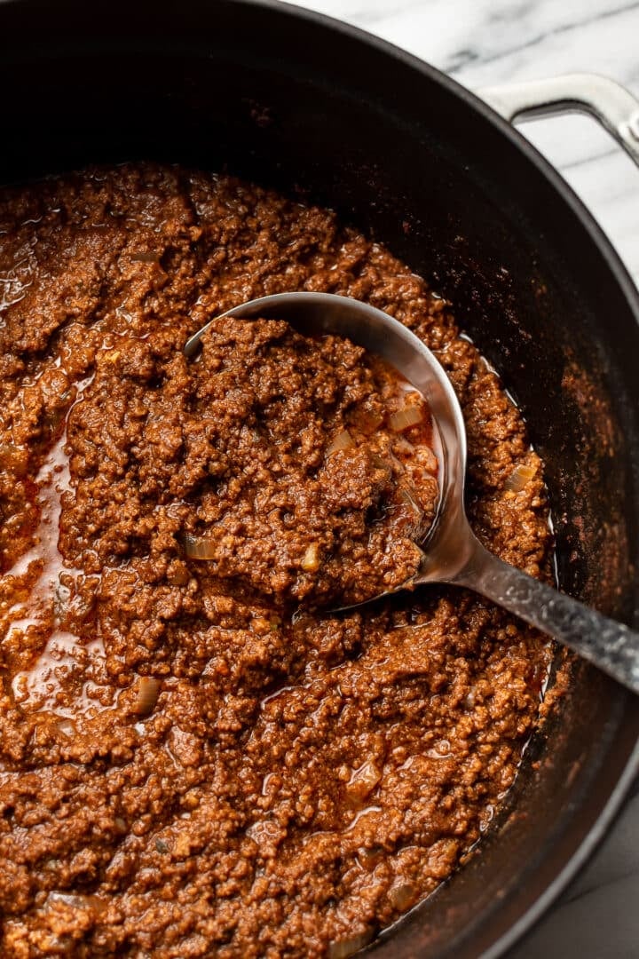 a ladle with cincinnati chili