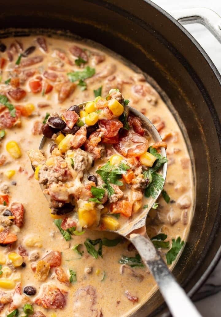 a ladle of creamy taco soup