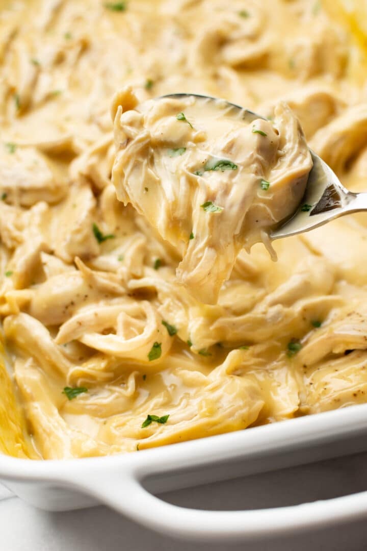 closeup of a casserole dish of chicken and gravy