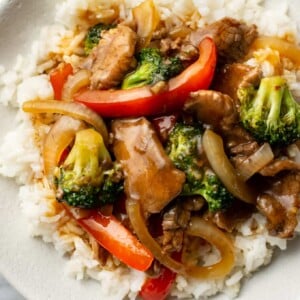 a bowl of beef stir fry with rice