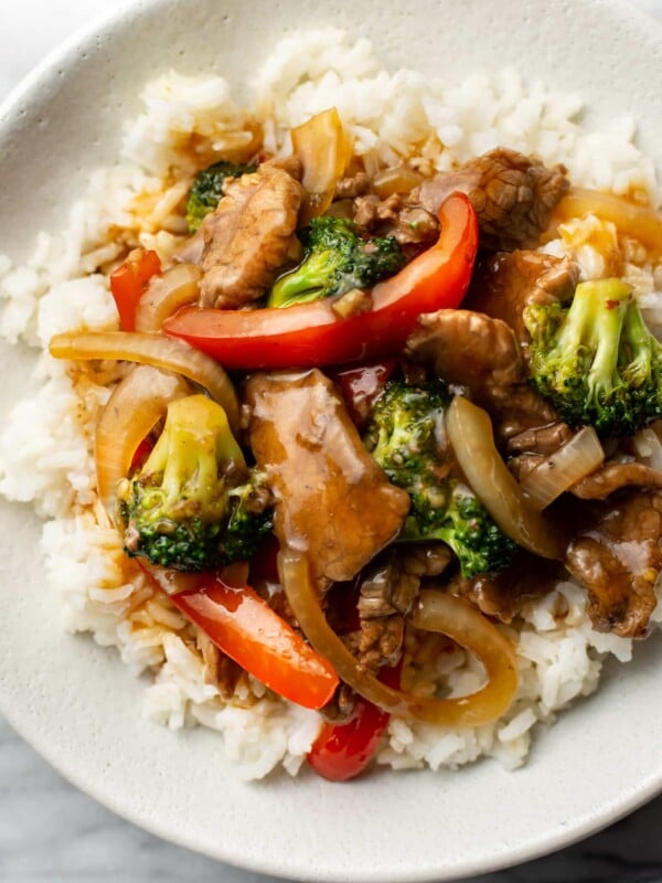 a bowl of beef stir fry with rice