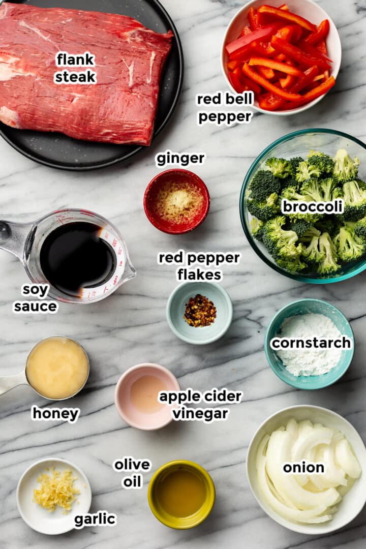 ingredients for beef stir fry in prep bowls