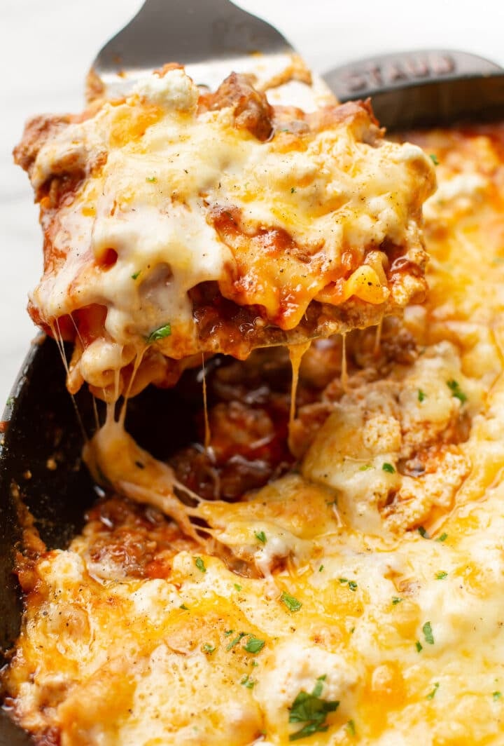 closeup of a portion of cheesy skillet lasagna