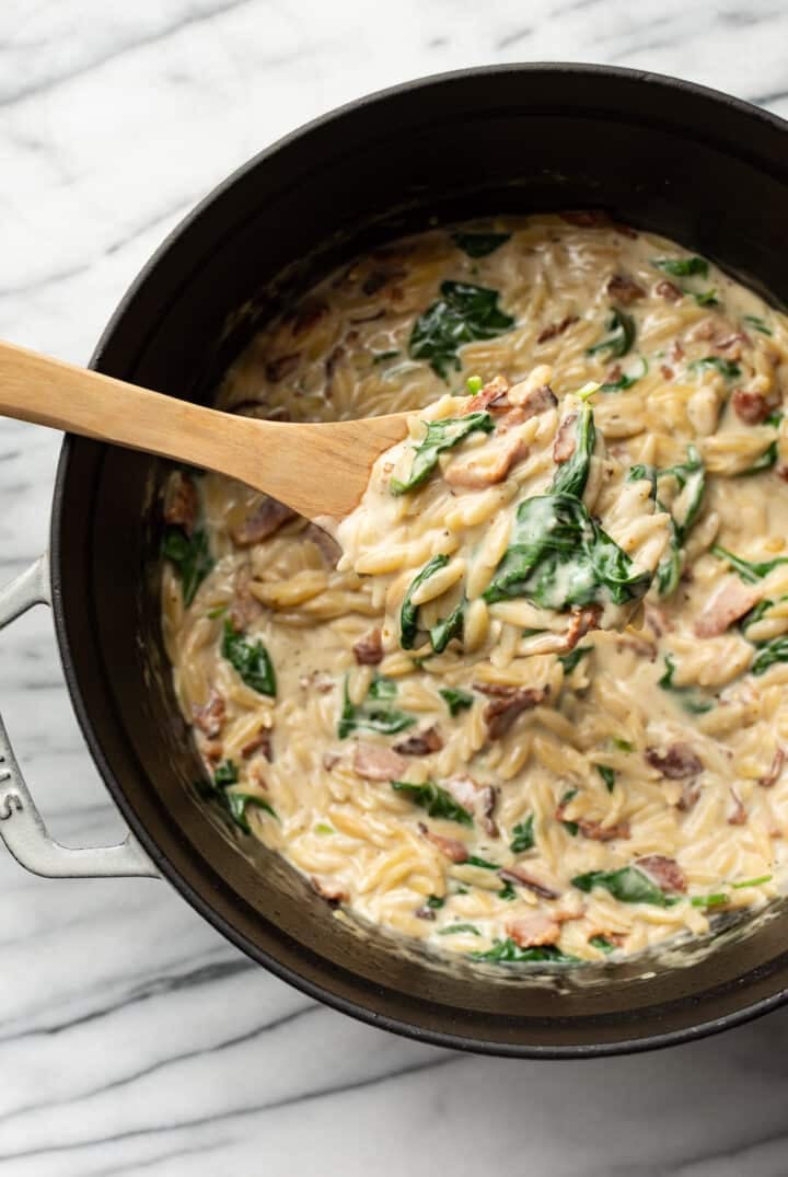 a spoonful of spinach bacon orzo