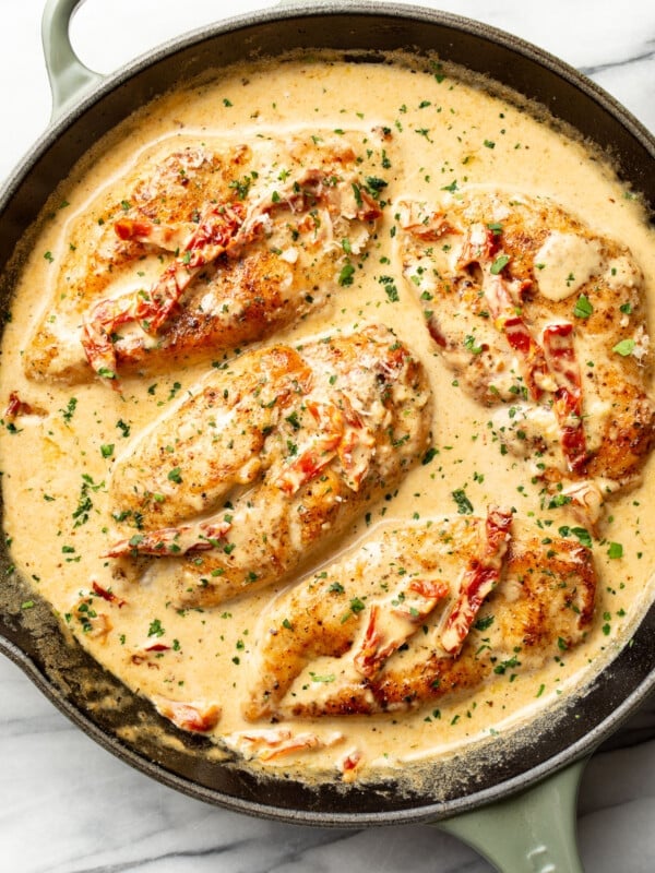 a skillet with creamy cajun chicken