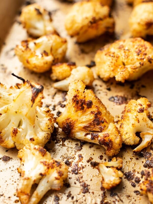 closeup of a baking tray with roasted cauliflower