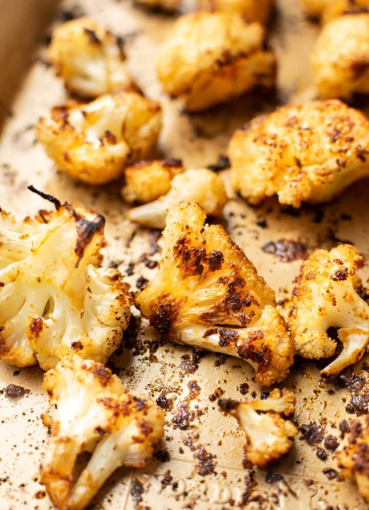 closeup of a baking tray with roasted cauliflower