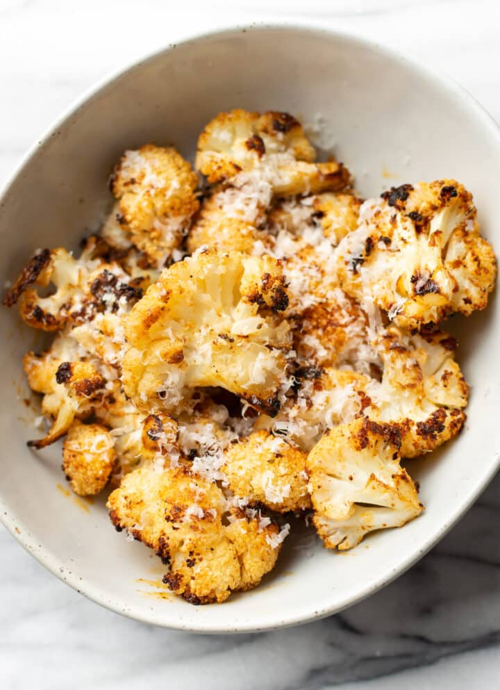 a bowl of roasted cauliflower with parmesan