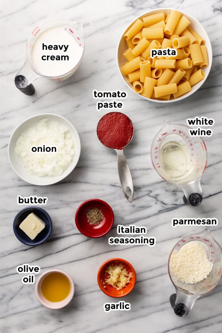 ingredients for pink sauce pasta in prep bowls