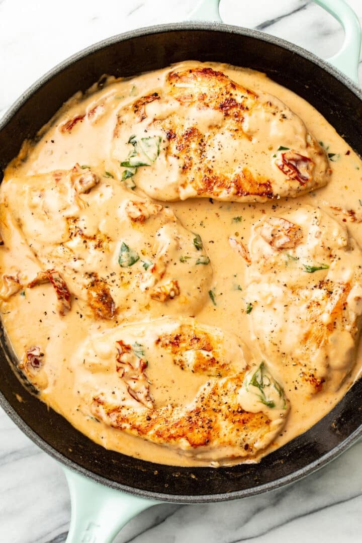 a cast iron skillet with marry me chicken