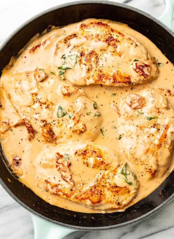 a cast iron skillet with marry me chicken