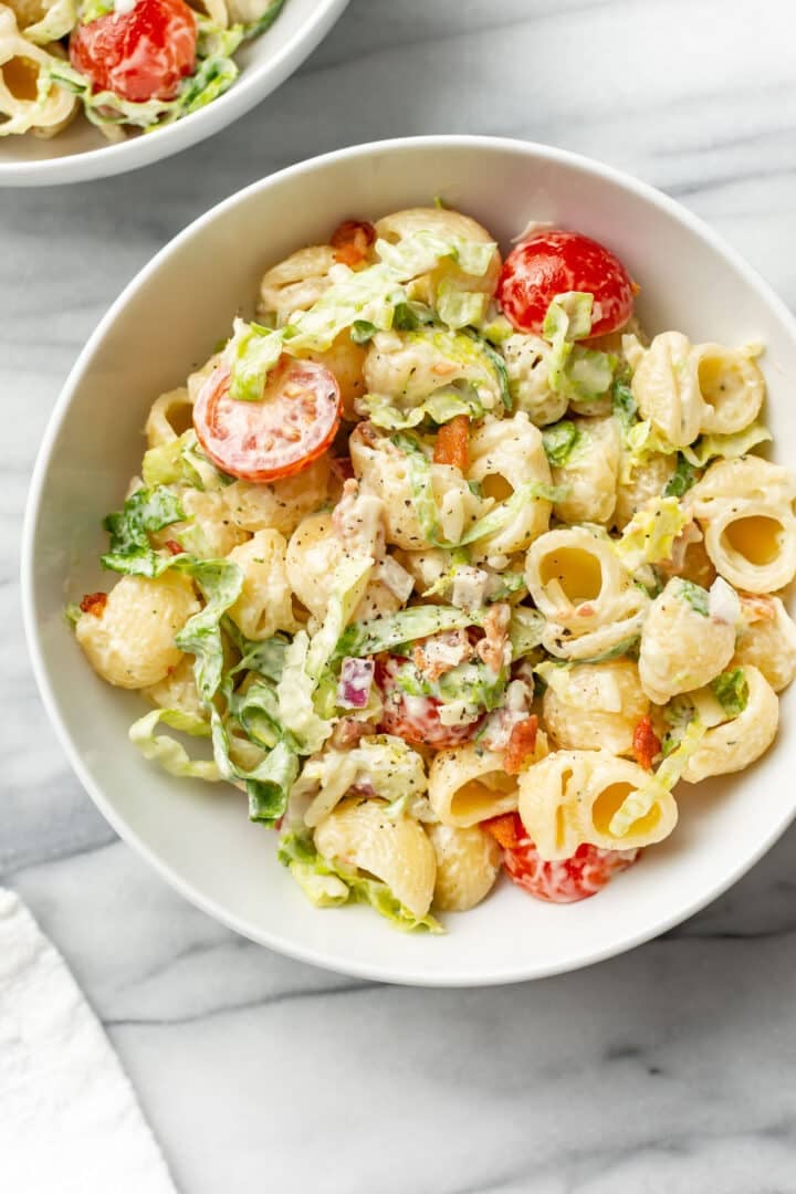 closeup of two bowls of BLT pasta salad