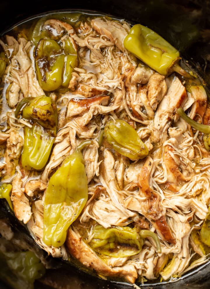 a slow cooker with Mississippi chicken