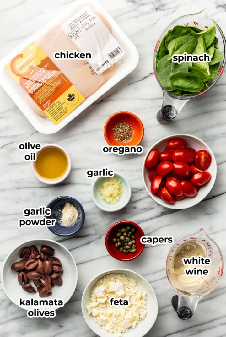 ingredients for mediterranean chicken in prep bowls