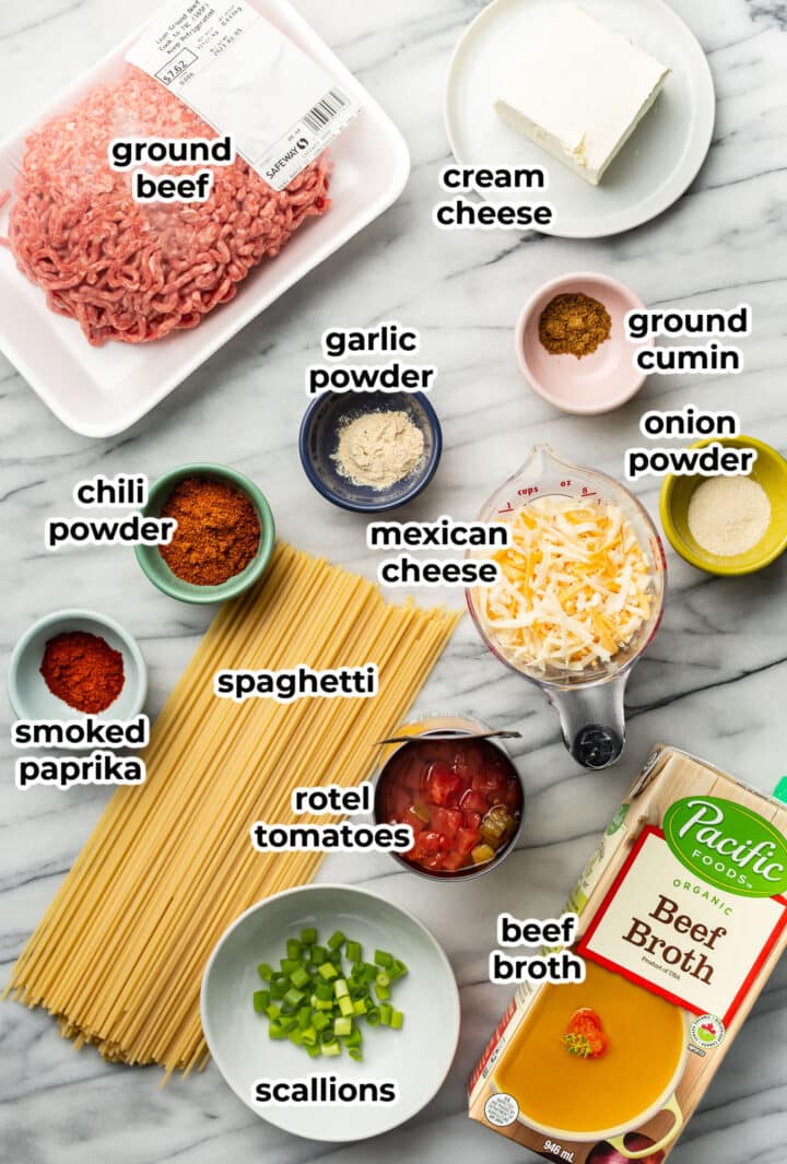 ingredients for taco spaghetti in prep bowls