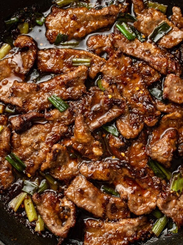 a skillet with mongolian beef