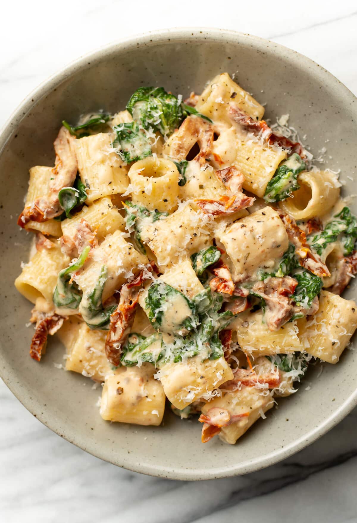 a bowl of sun-dried tomato pasta