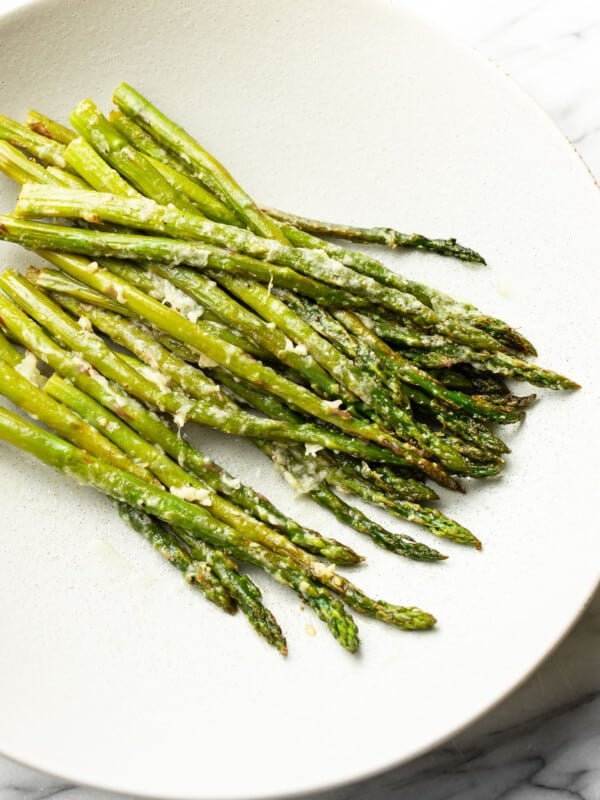 a bowl of parmesan roasted asparagus