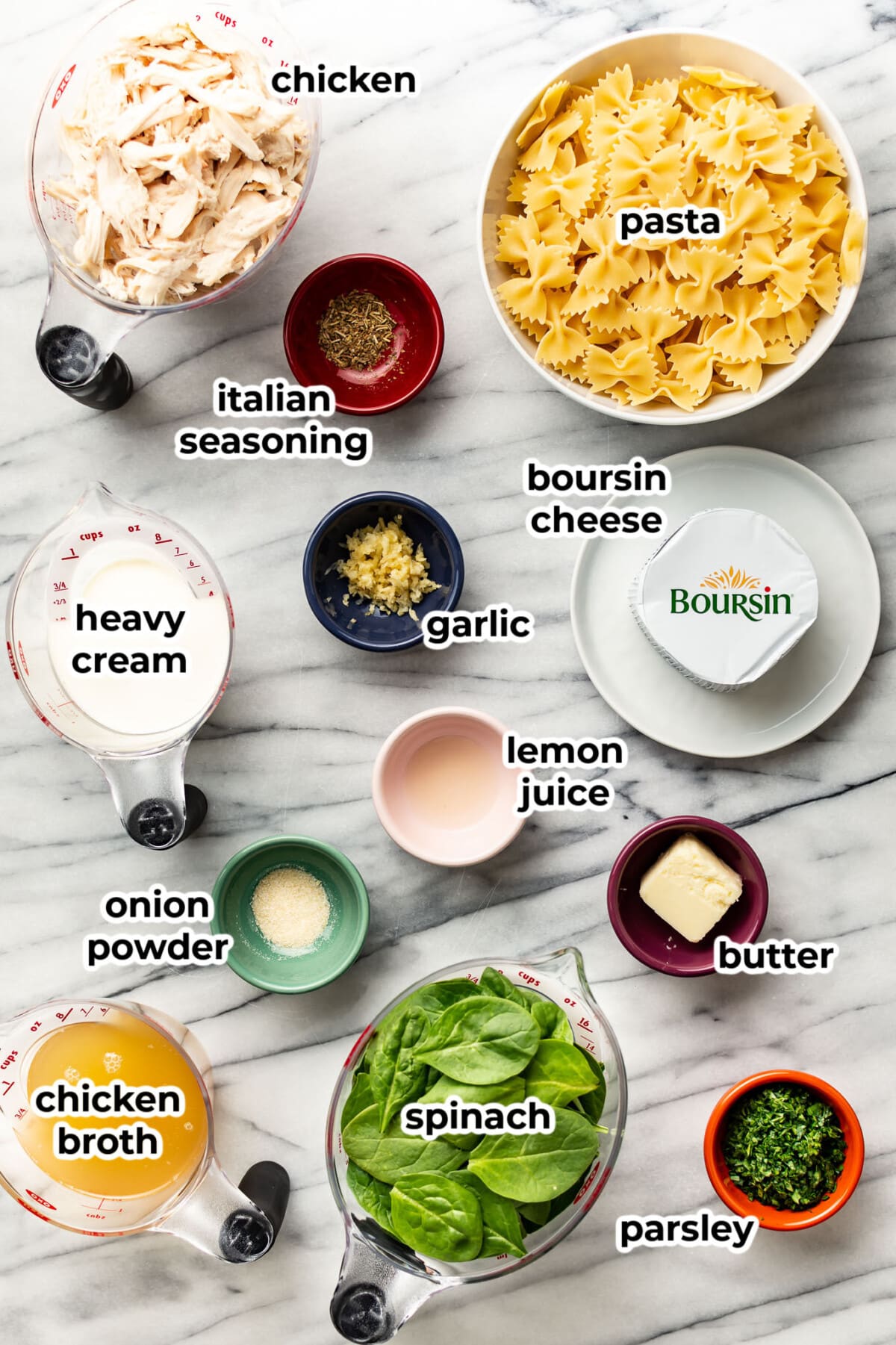 ingredients for boursin chicken pasta in prep bowls