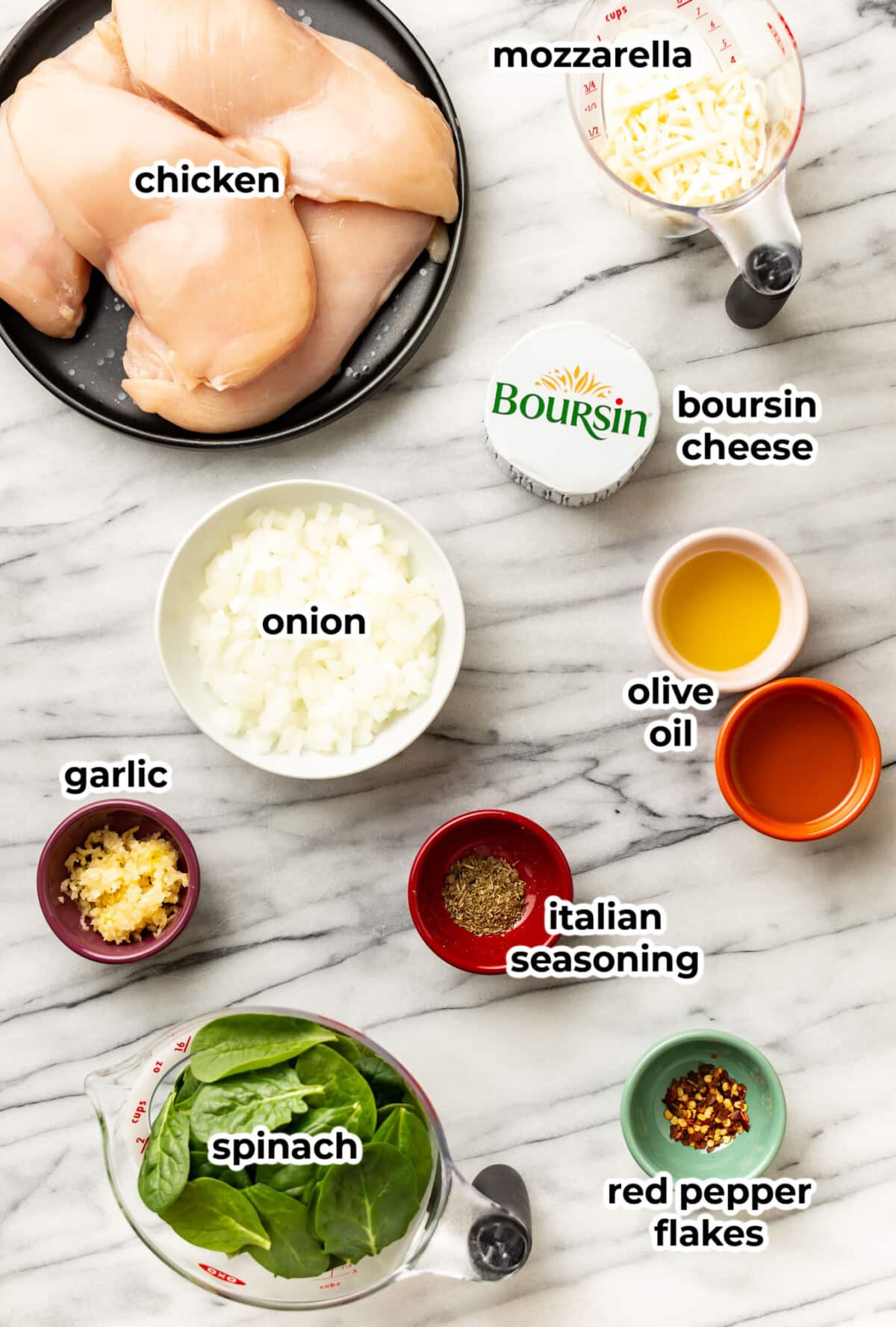 ingredients for stuffed chicken breasts in prep bowls