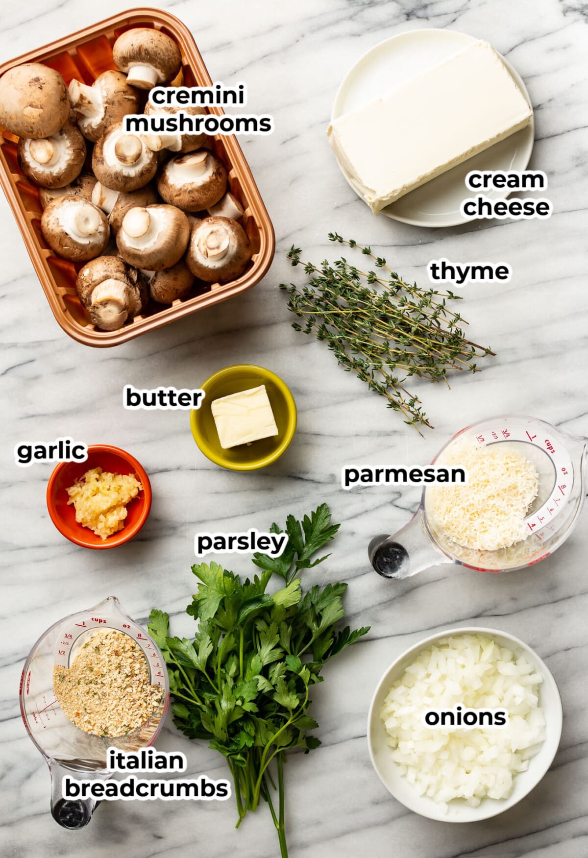 ingredients for easy stuffed mushrooms in prep bowls