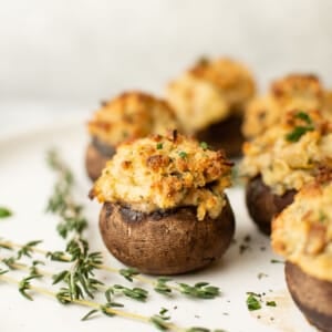 a plate with several stuffed mushrooms