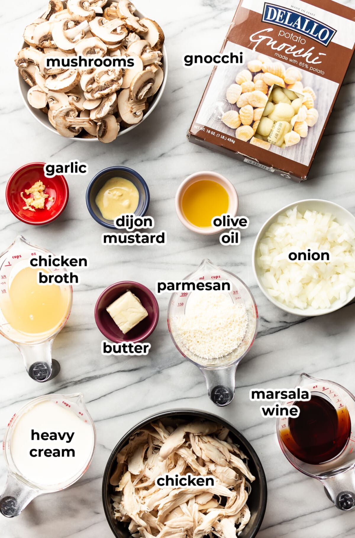ingredients for chicken marsala gnocchi in prep bowls