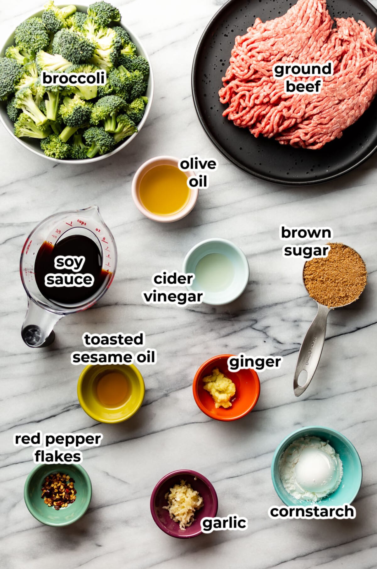 ingredients for ground beef and broccoli in prep bowls