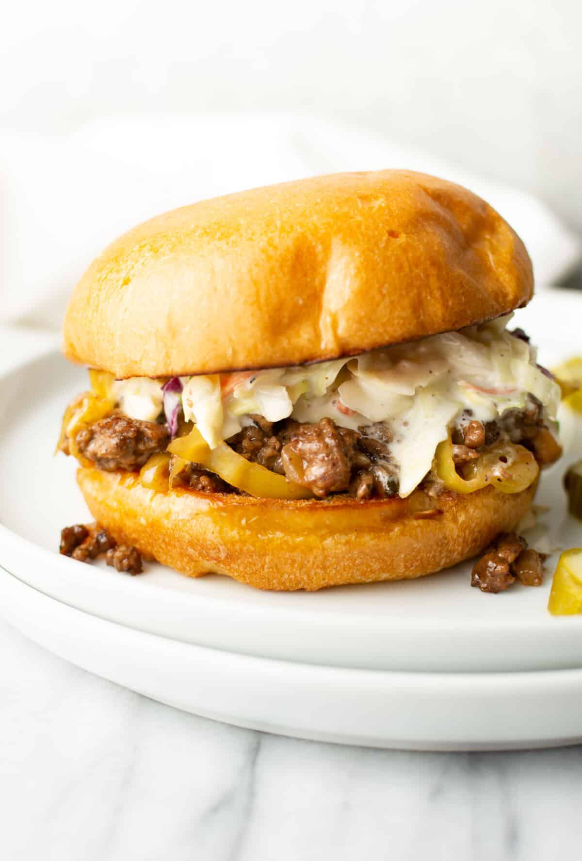 a plate with a mississippi sloppy joe sandwich