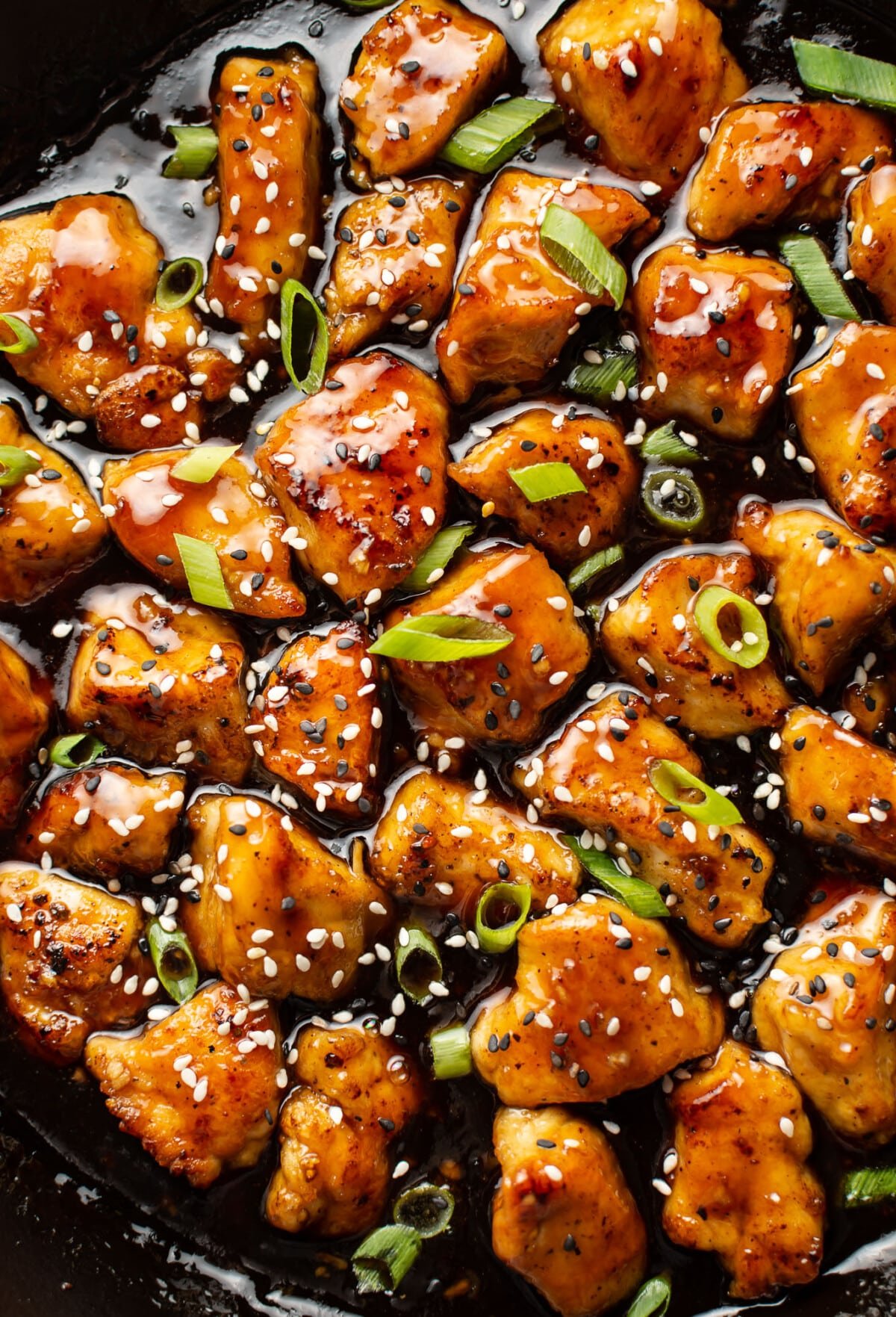 closeup of a skillet with teriyaki chicken
