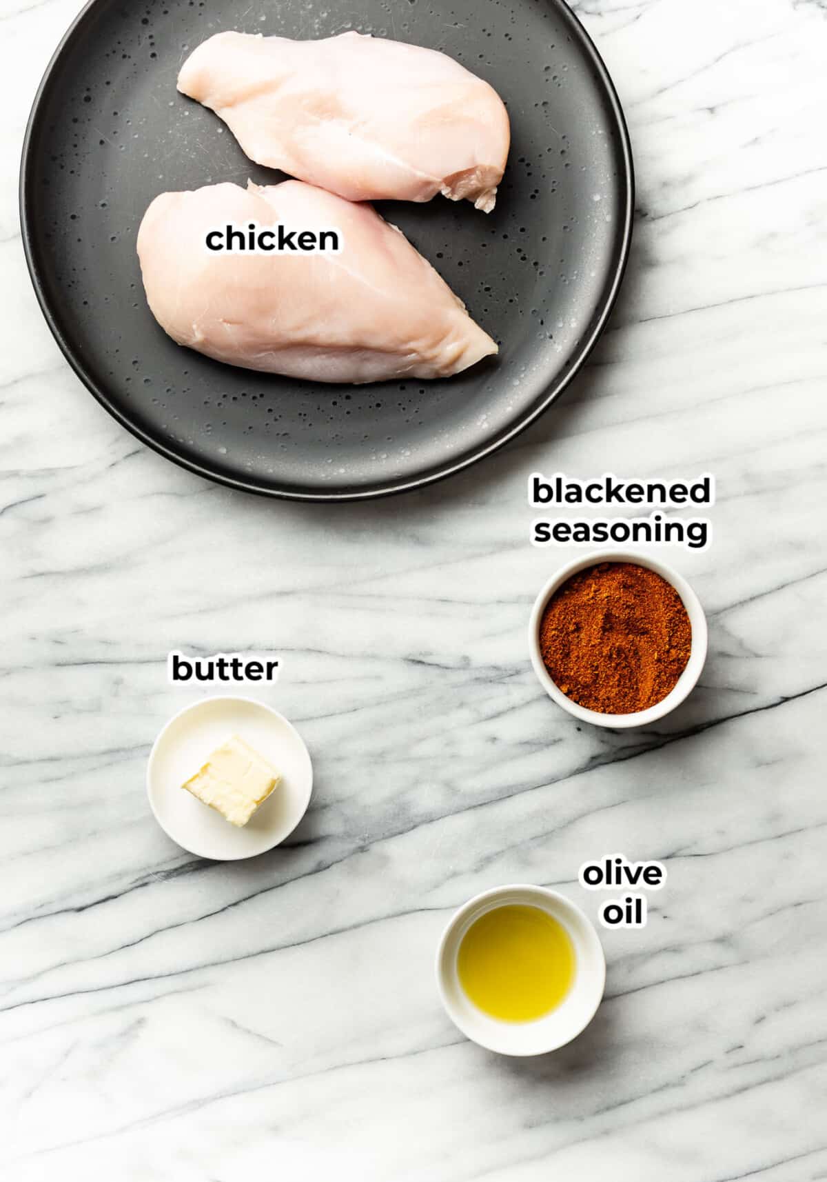 ingredients for blackened chicken in prep bowls