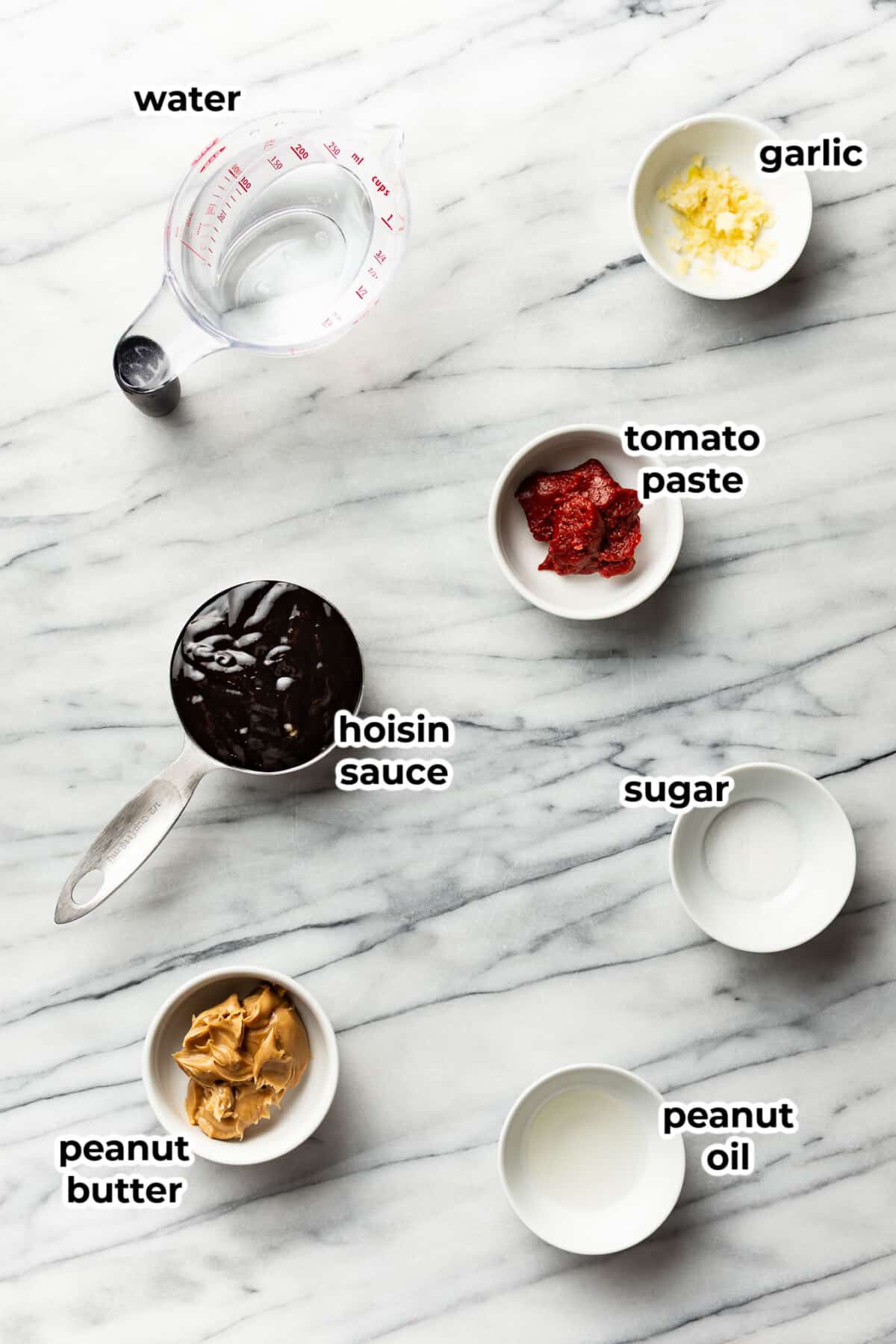 ingredients for peanut sauce in prep bowls